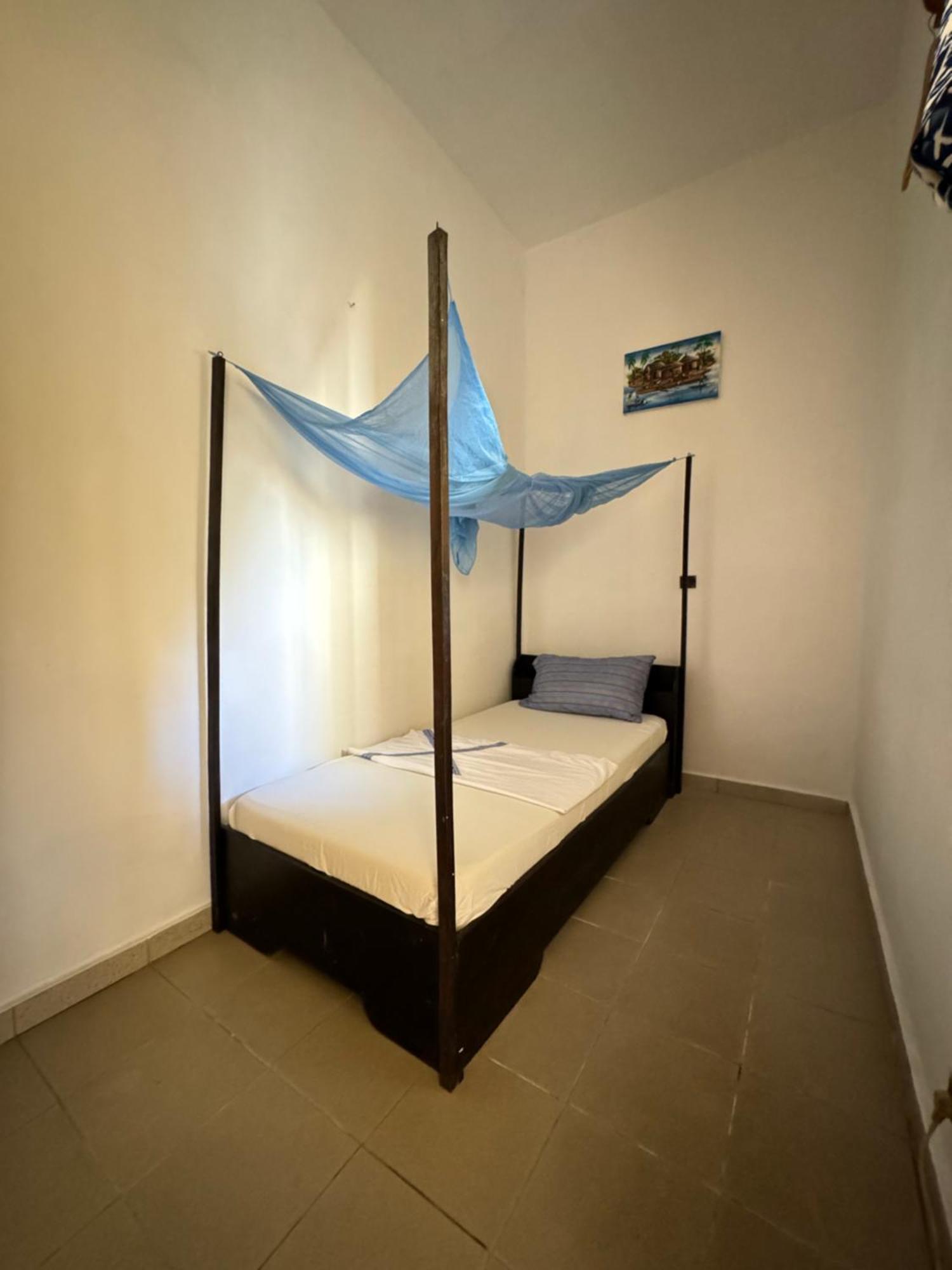 Guesthouse Cocotiers 코토누 외부 사진
